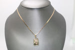 14kt Tri-tone Baby Jesus Pendant with 14kt Rose Gold Hollow Trace Chain - Sell Gold NYC