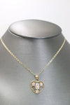 14kt Tri-tone White Sapphire Flowers Virgin Mary Heart Pendant with 14kt Tri-tone Hollow Trace Chain - Sell Gold NYC
